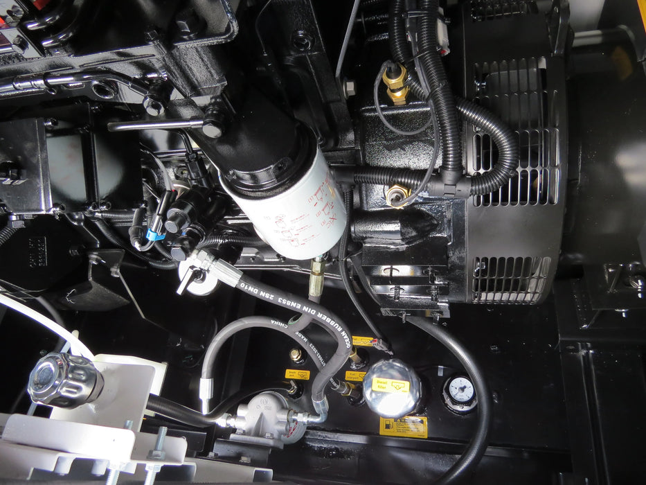 Close-up of Cummins engine components inside 26kW diesel generator for durability and long service life